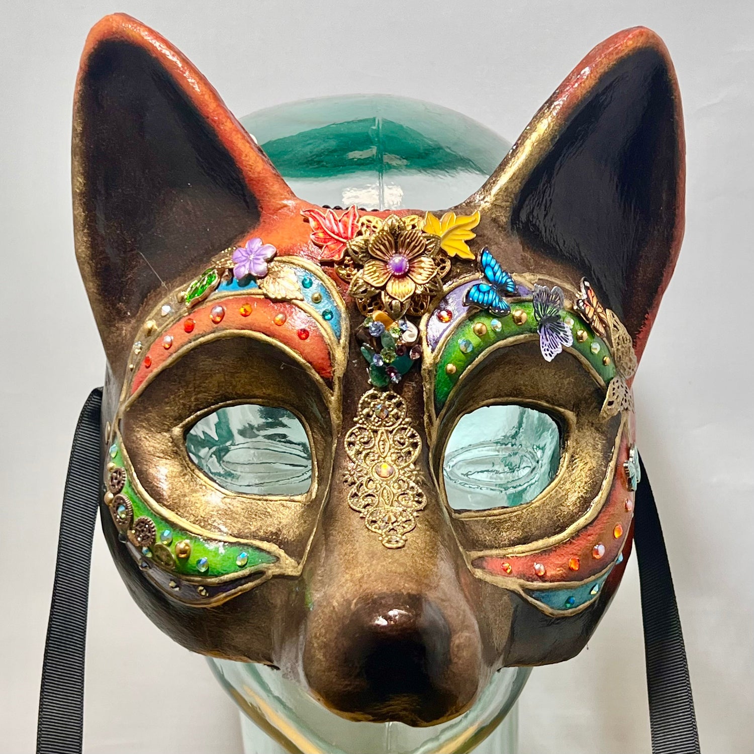 papier-mache wold with enamel flowers